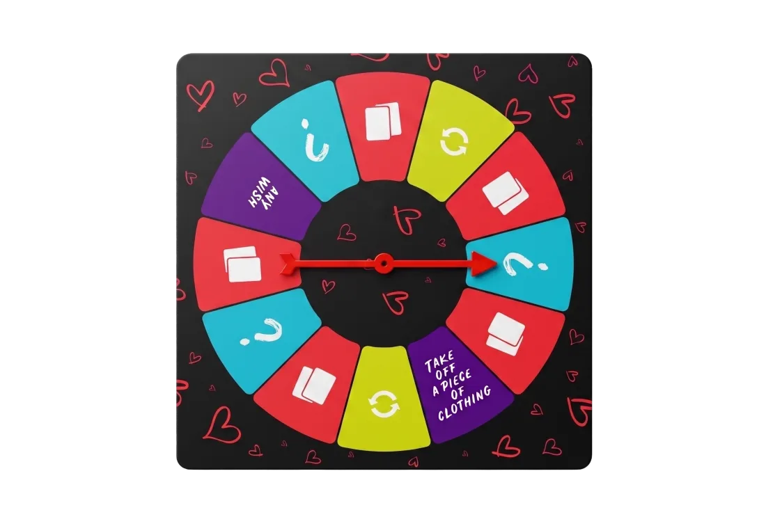 The Loopy spinner board: a red arrow over coloured segments, one reading Take off a piece of clothing